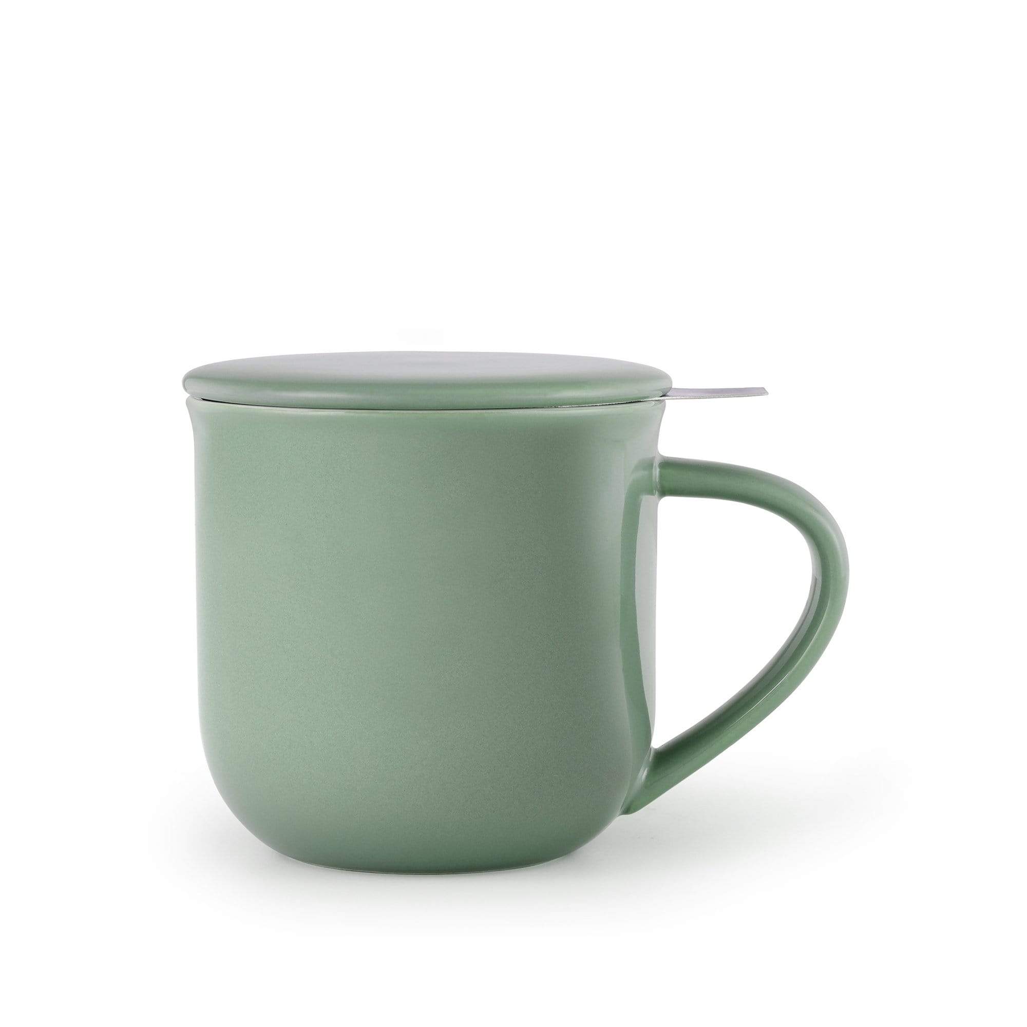 Green mug with lid on a white background