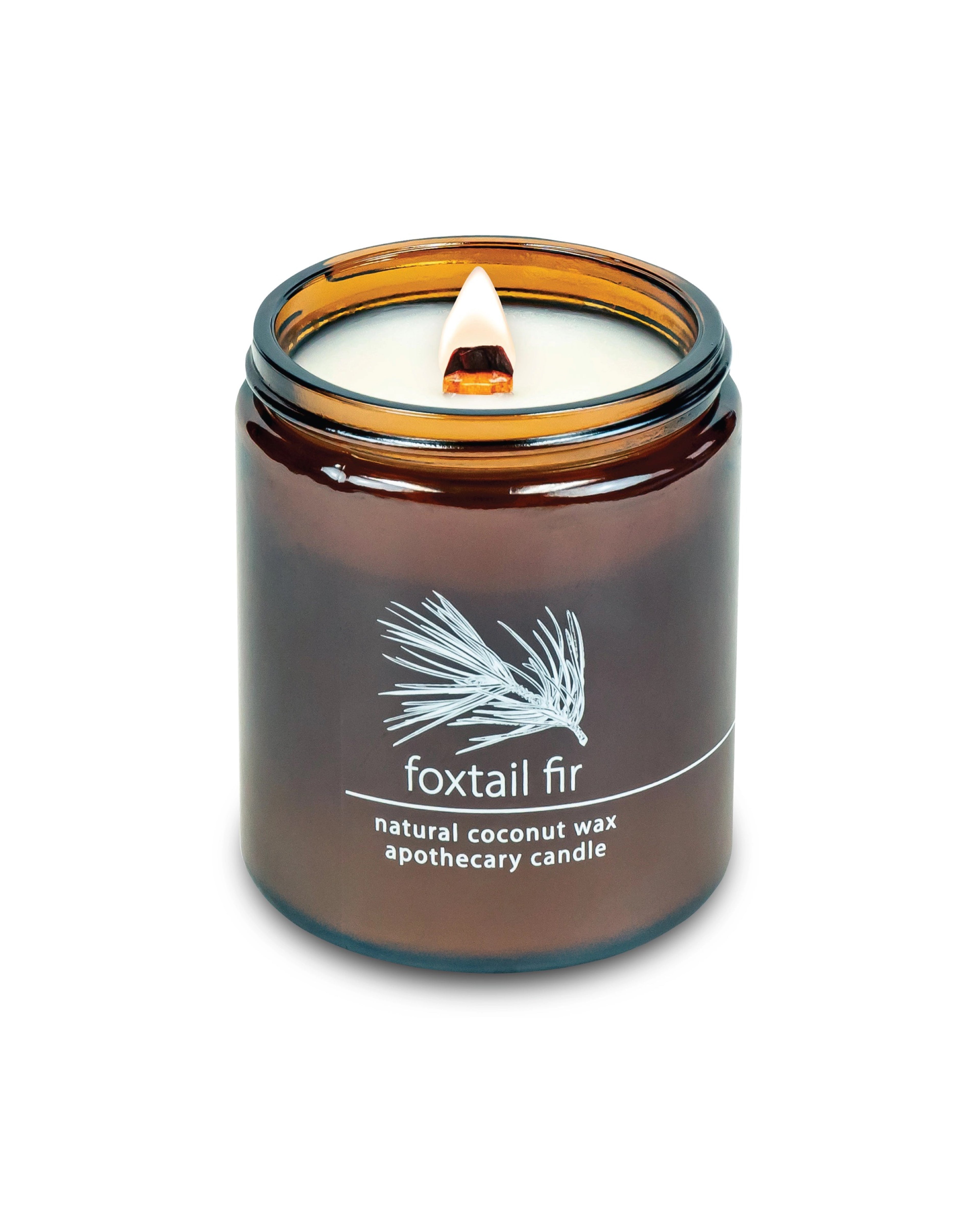 Candle in an amber jar on a white background