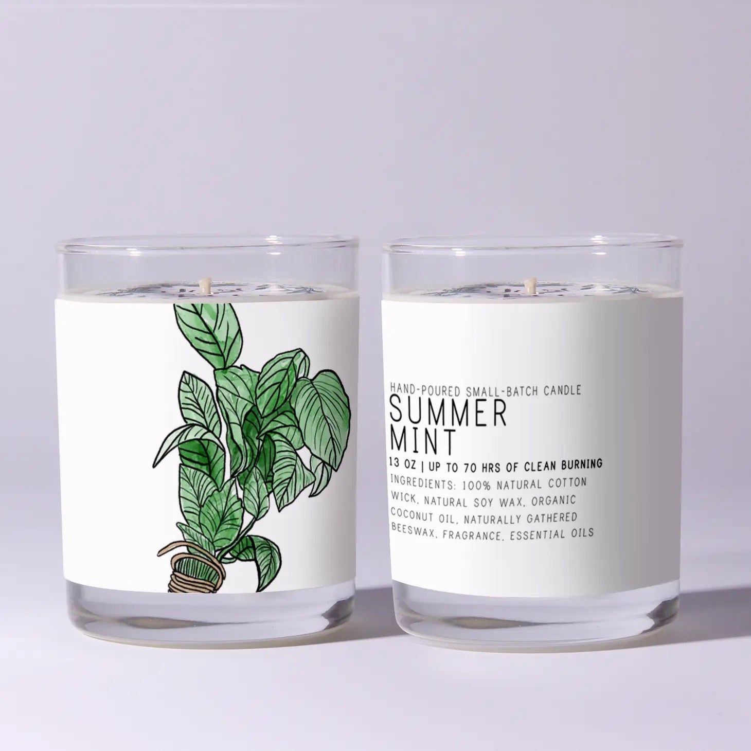Two candles with labels on a light gray background