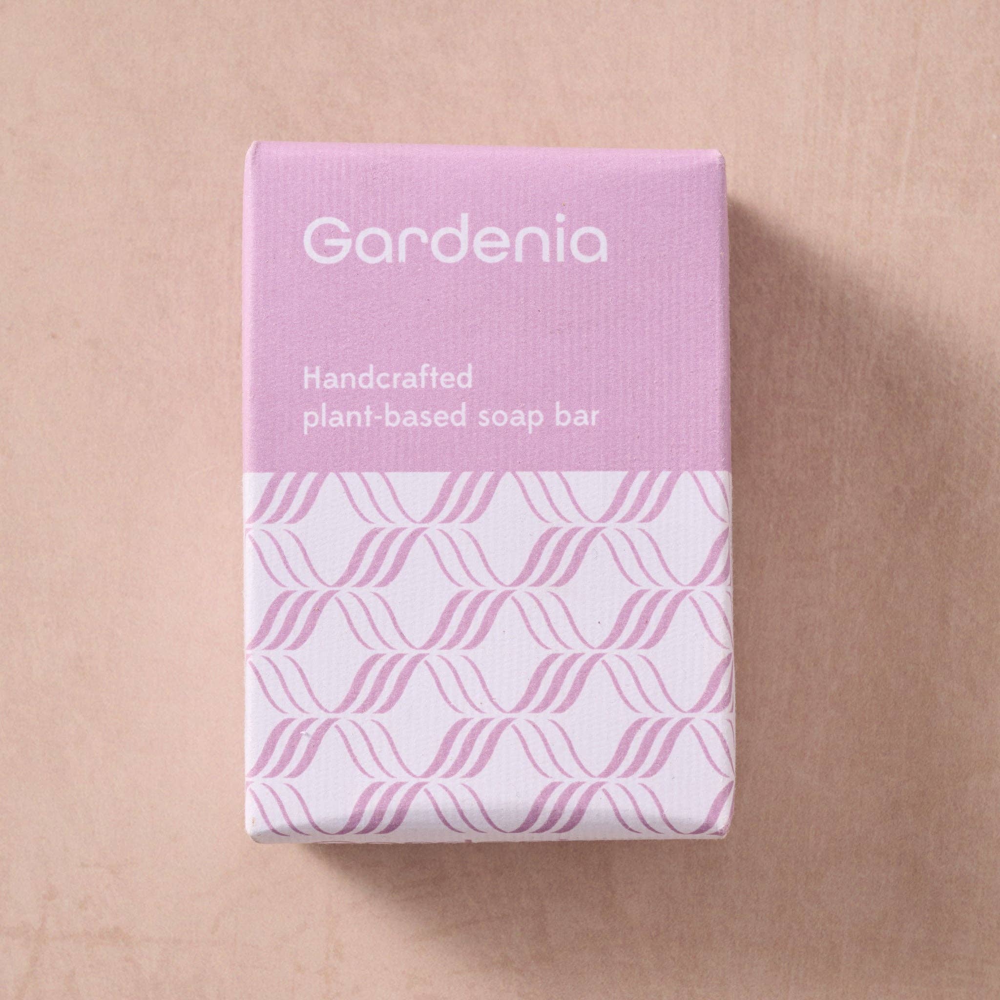 Gardenia handcrafted plant-based soap bar packaging on a beige background