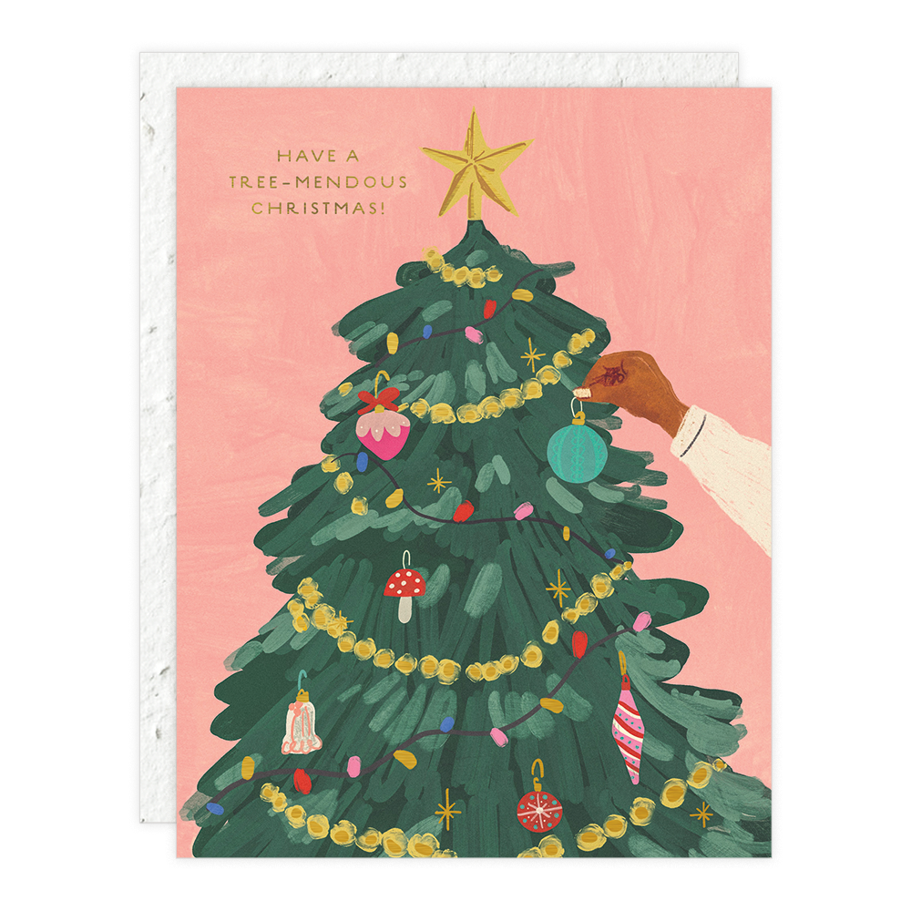 Christmas card with a decorated tree and 'Have a Tree-mendous Christmas!' text on a pink background