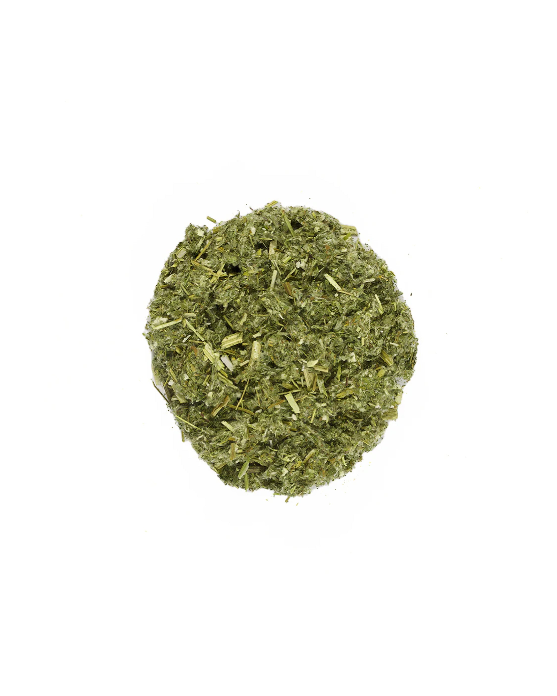 Pile of dried herbs on a white background