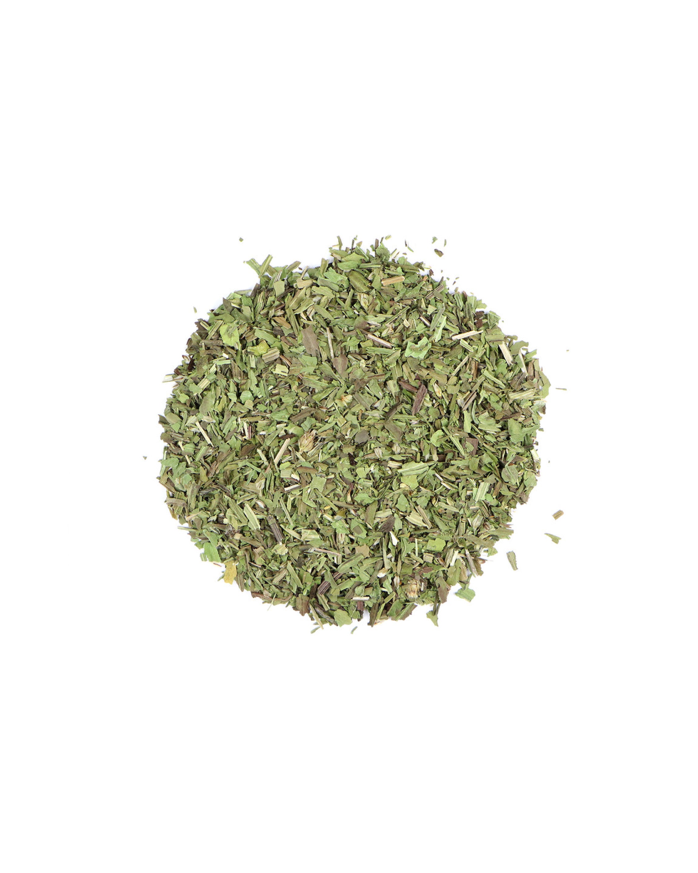 Dried green herbs on a white background