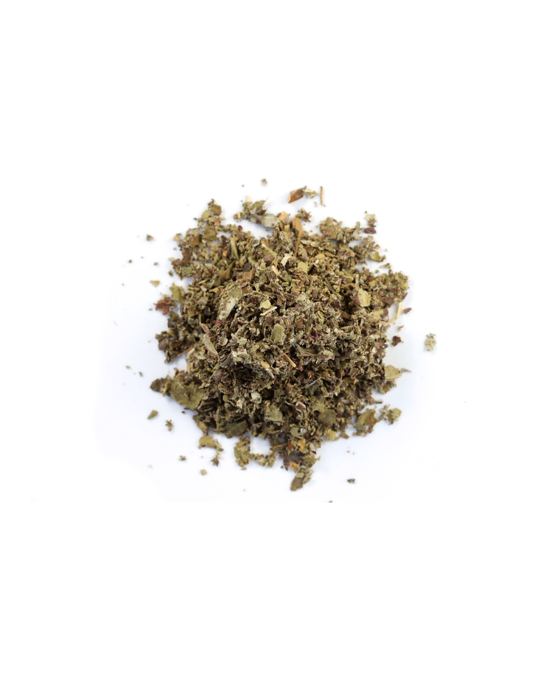 Pile of dried herbs on a white background