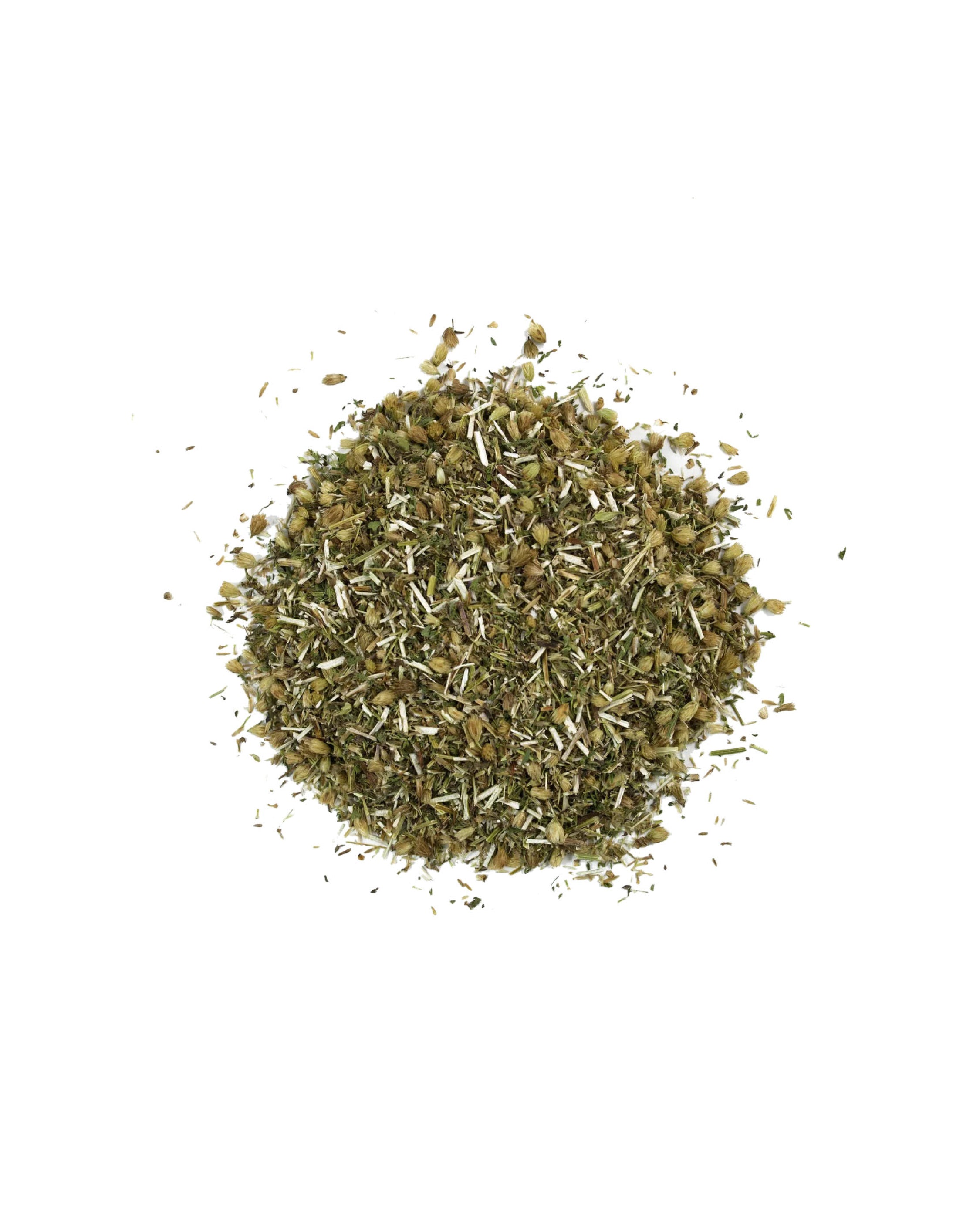 Pile of dried herbs on a white background