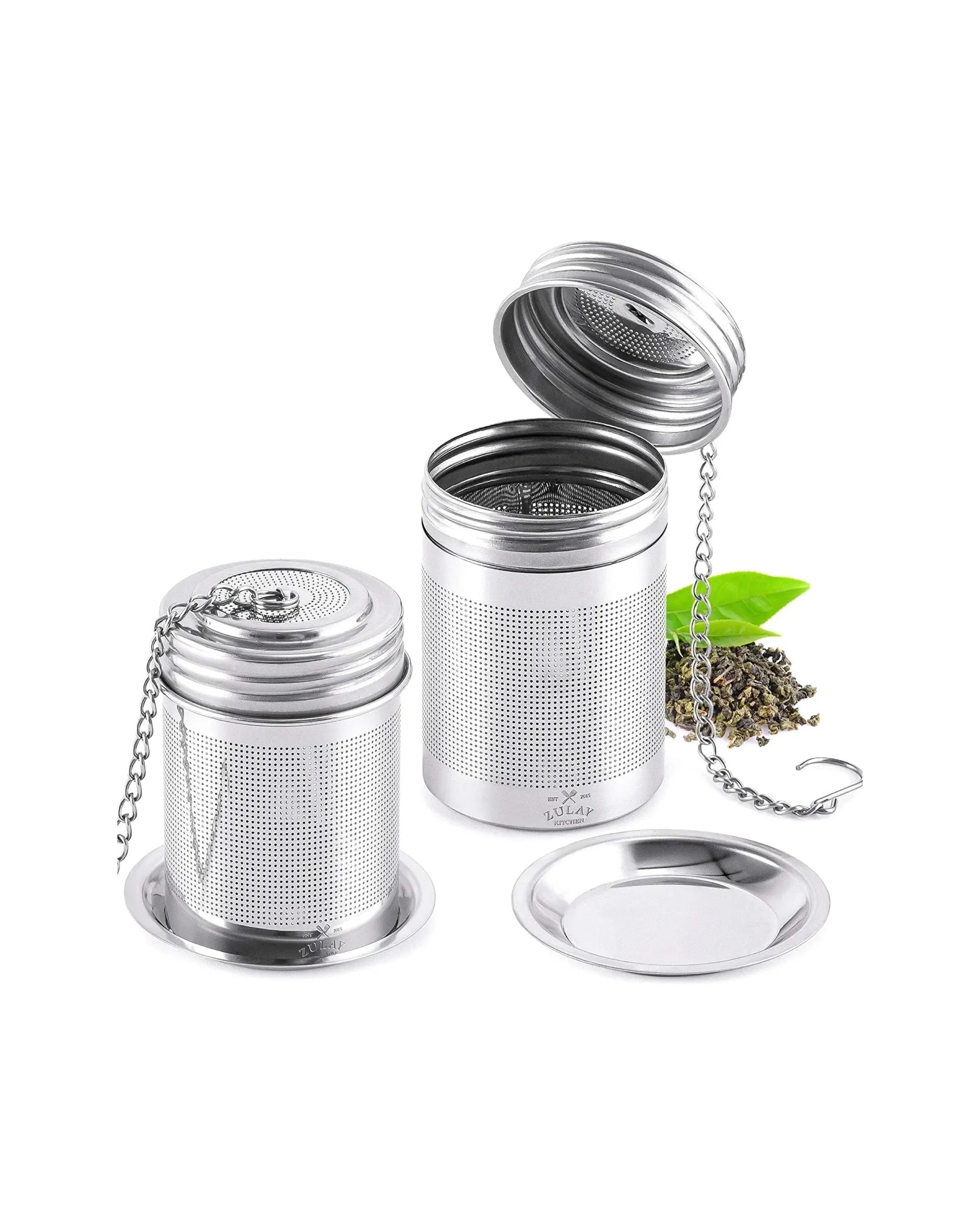 stainless steel tea infuser with a chain on a white background