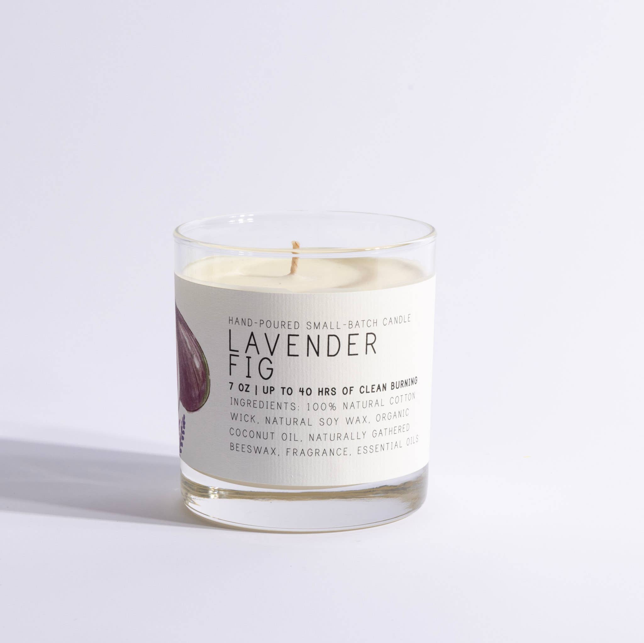 Candle labeled 'Lavender Fig' on a white background
