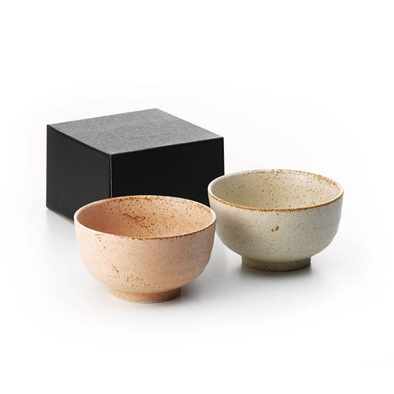 Two ceramic bowls with a black box on a white background
