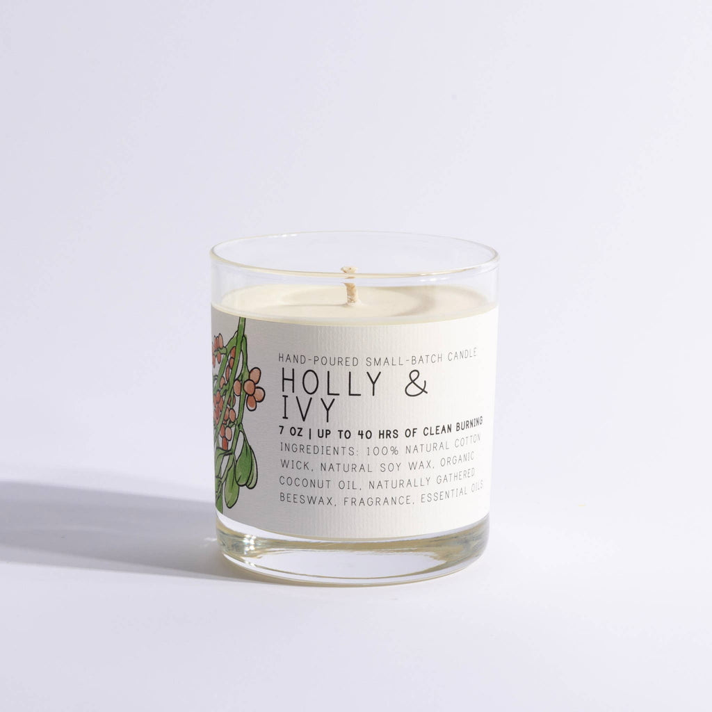 Candle with 'Holly & Ivy' label on a white background