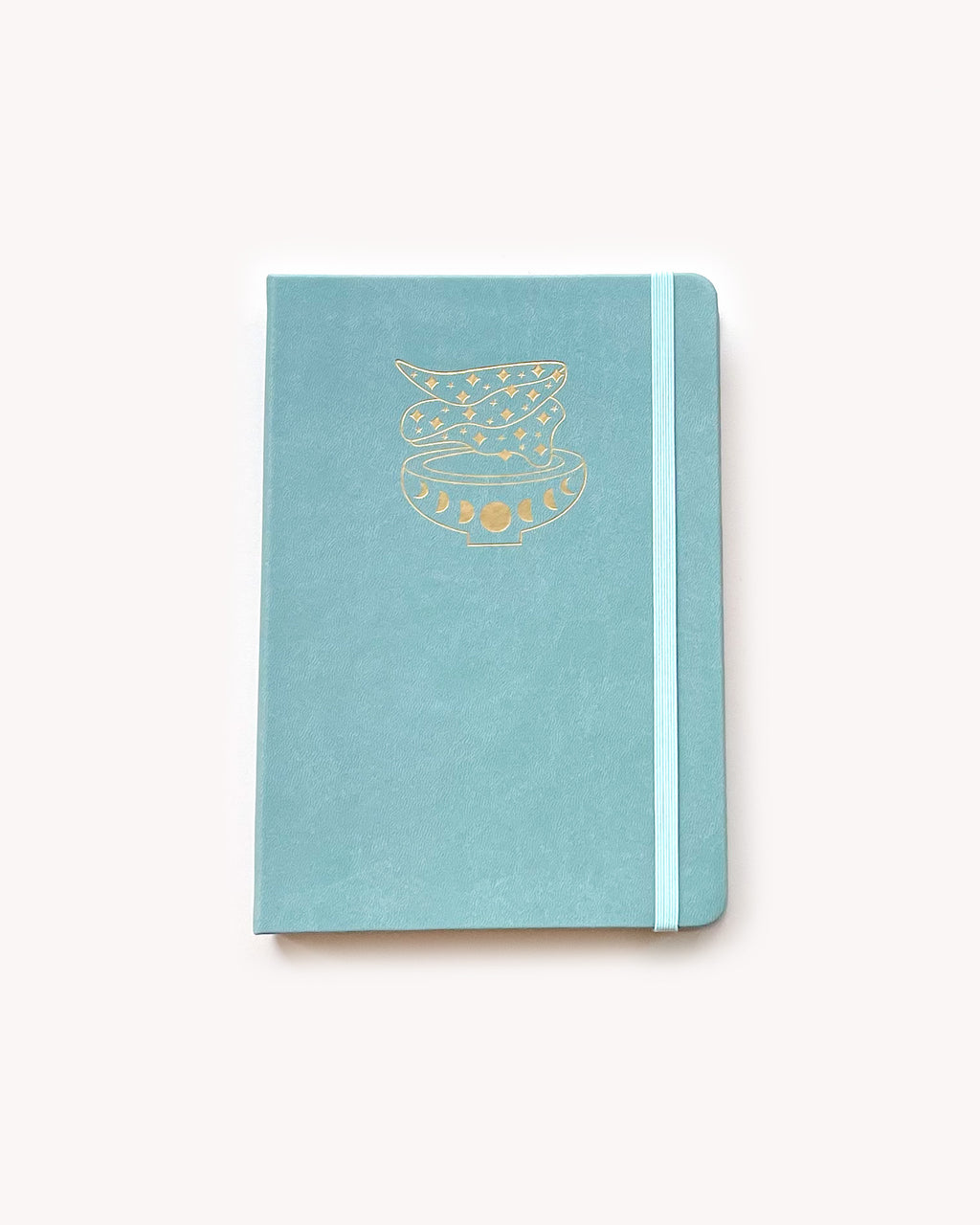Light blue notebook with gold design on a white background