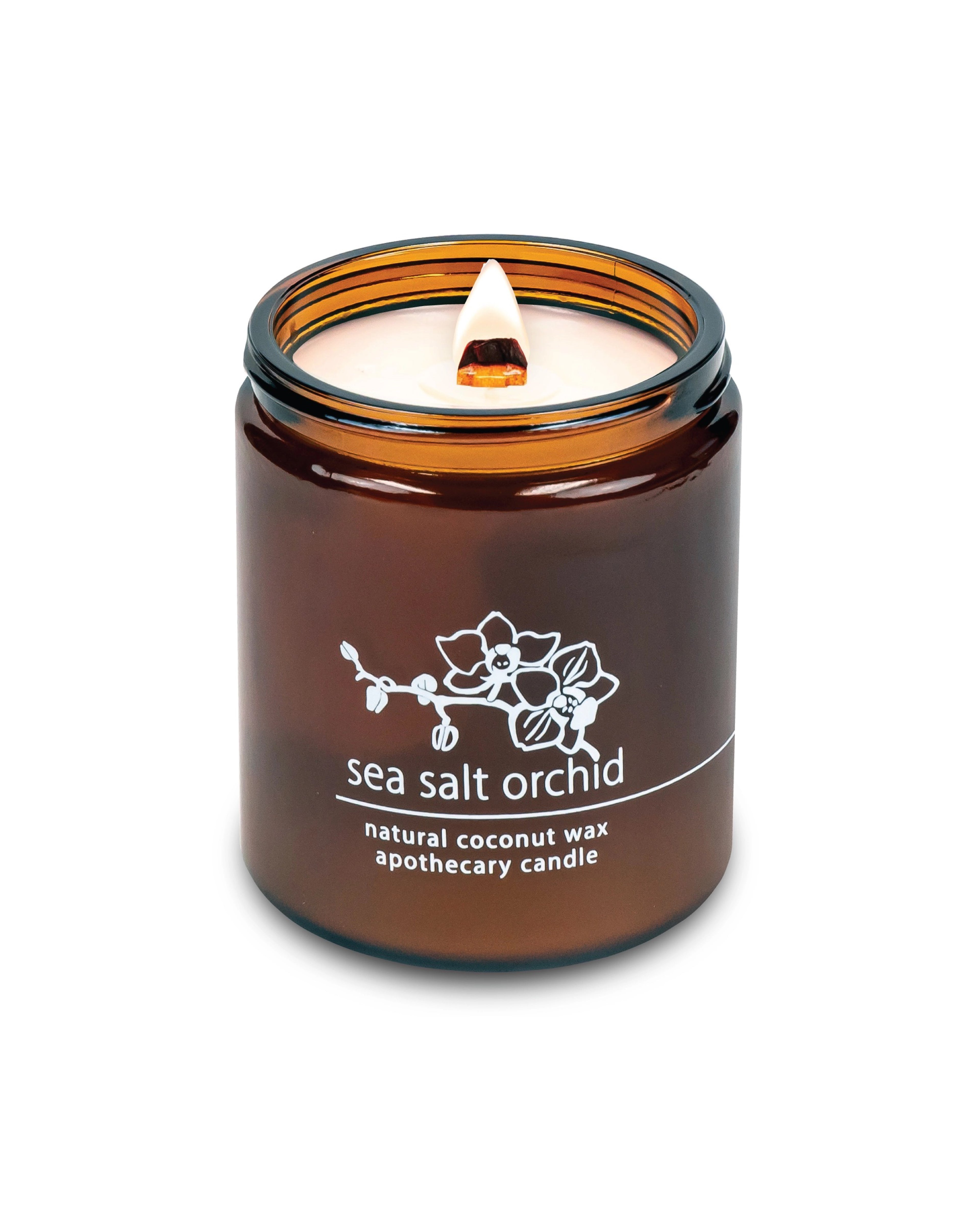 Candle in an amber jar on a white background