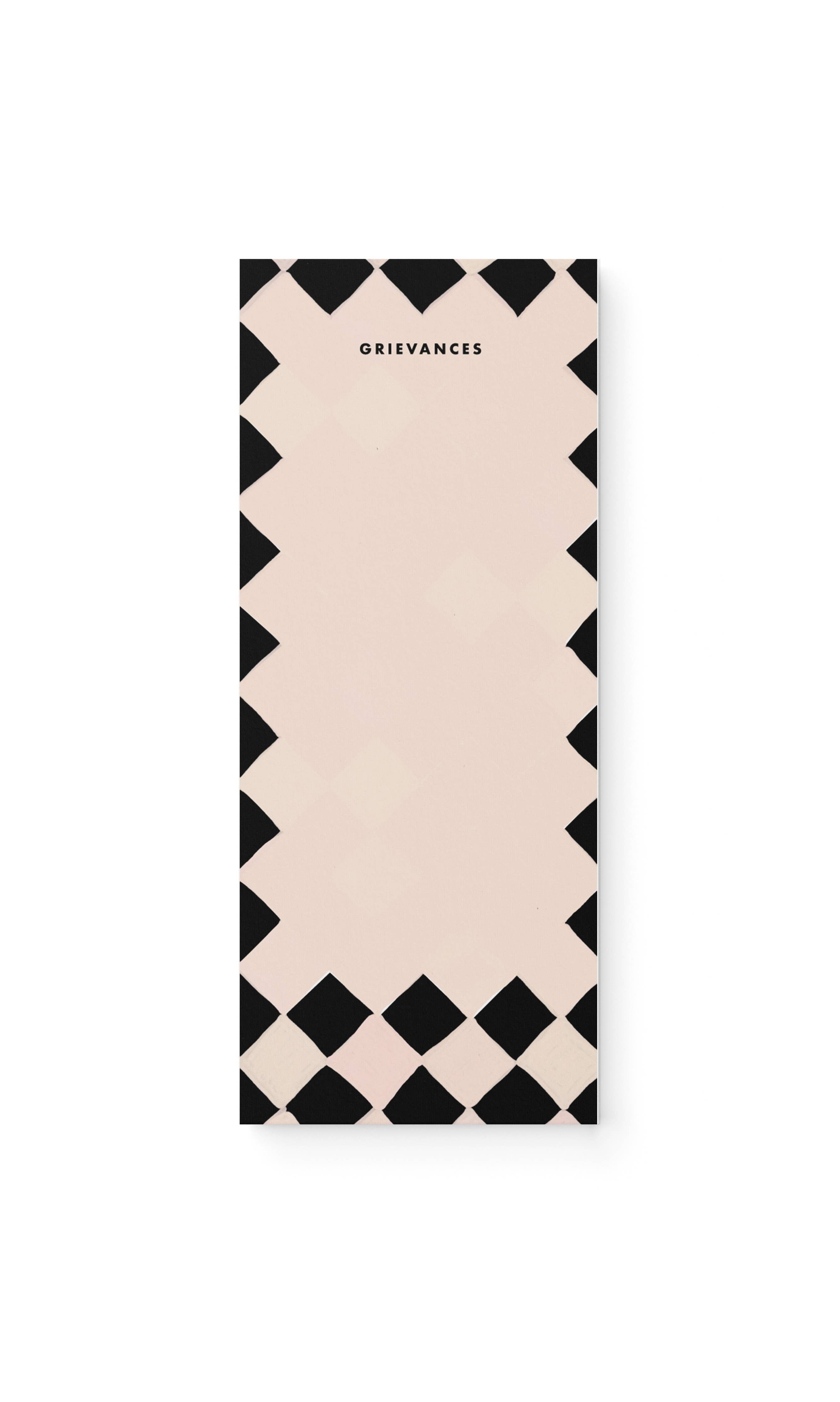 Notebook with black and white geometric pattern on a white background