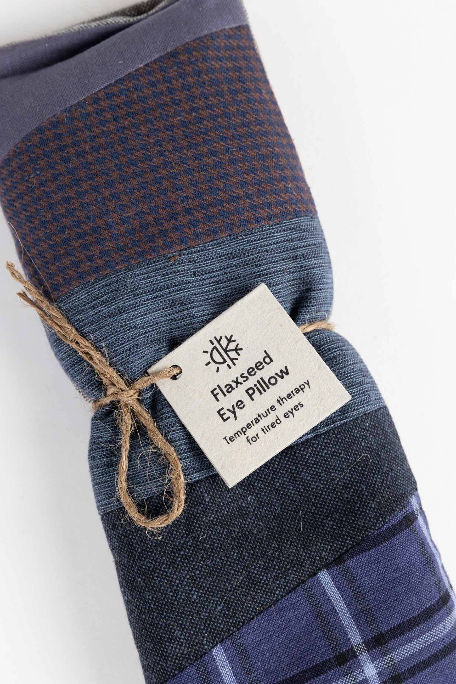 Flaxseed eye pillow with a label on a white background