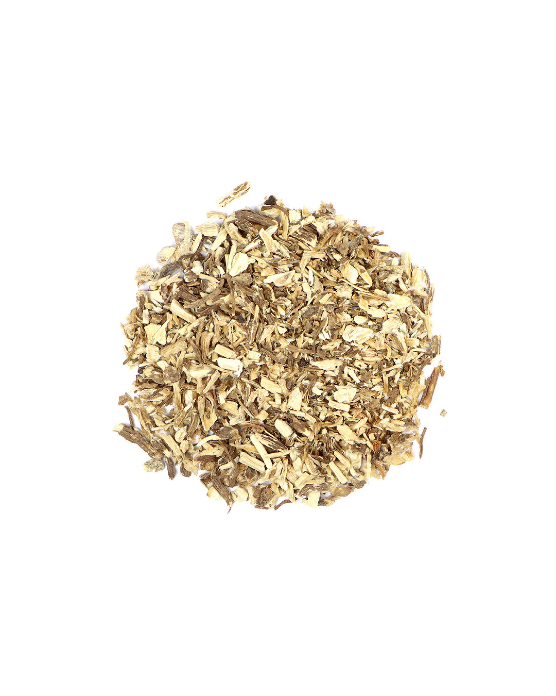 Pile of dried herbal roots on a white background