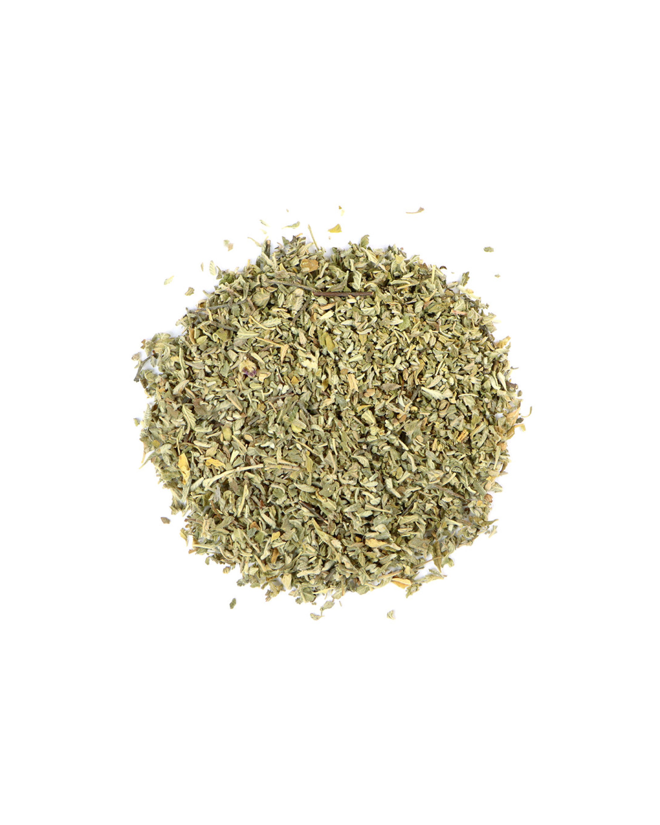 Pile of dried herbs on a white background