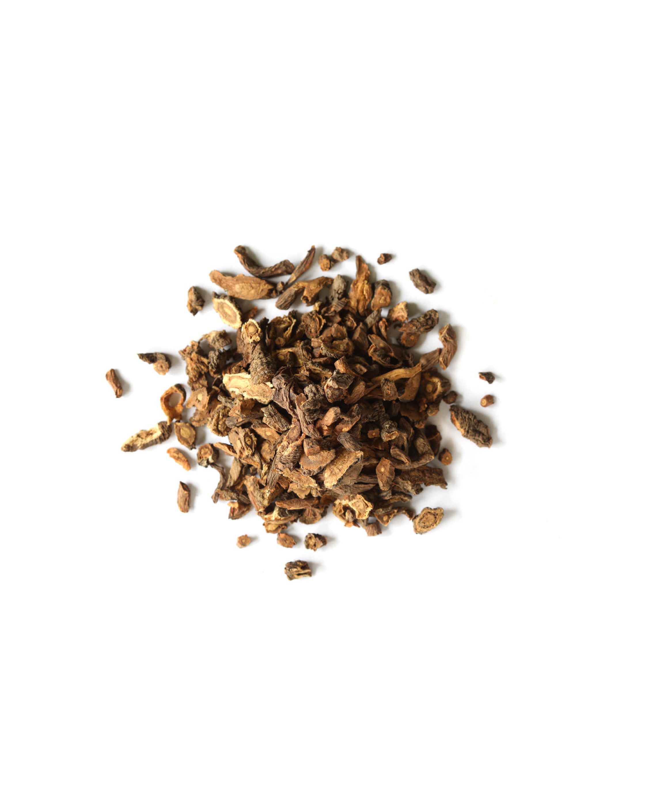 Pile of dried dandelion roots on a white background