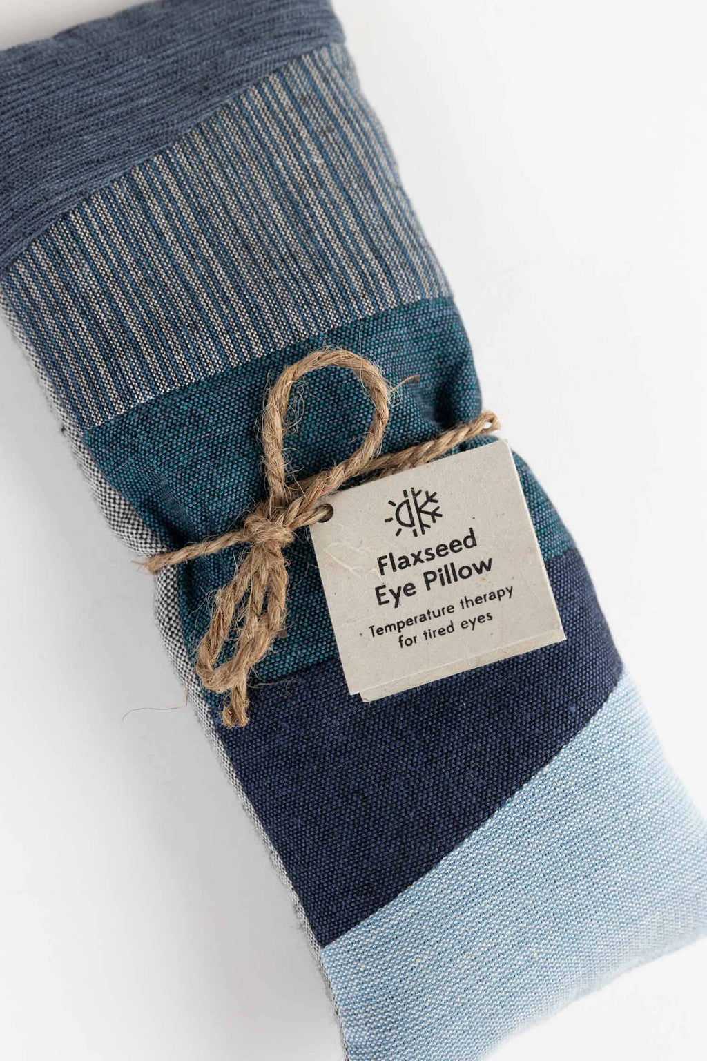 Flaxseed eye pillow with a label on a white background