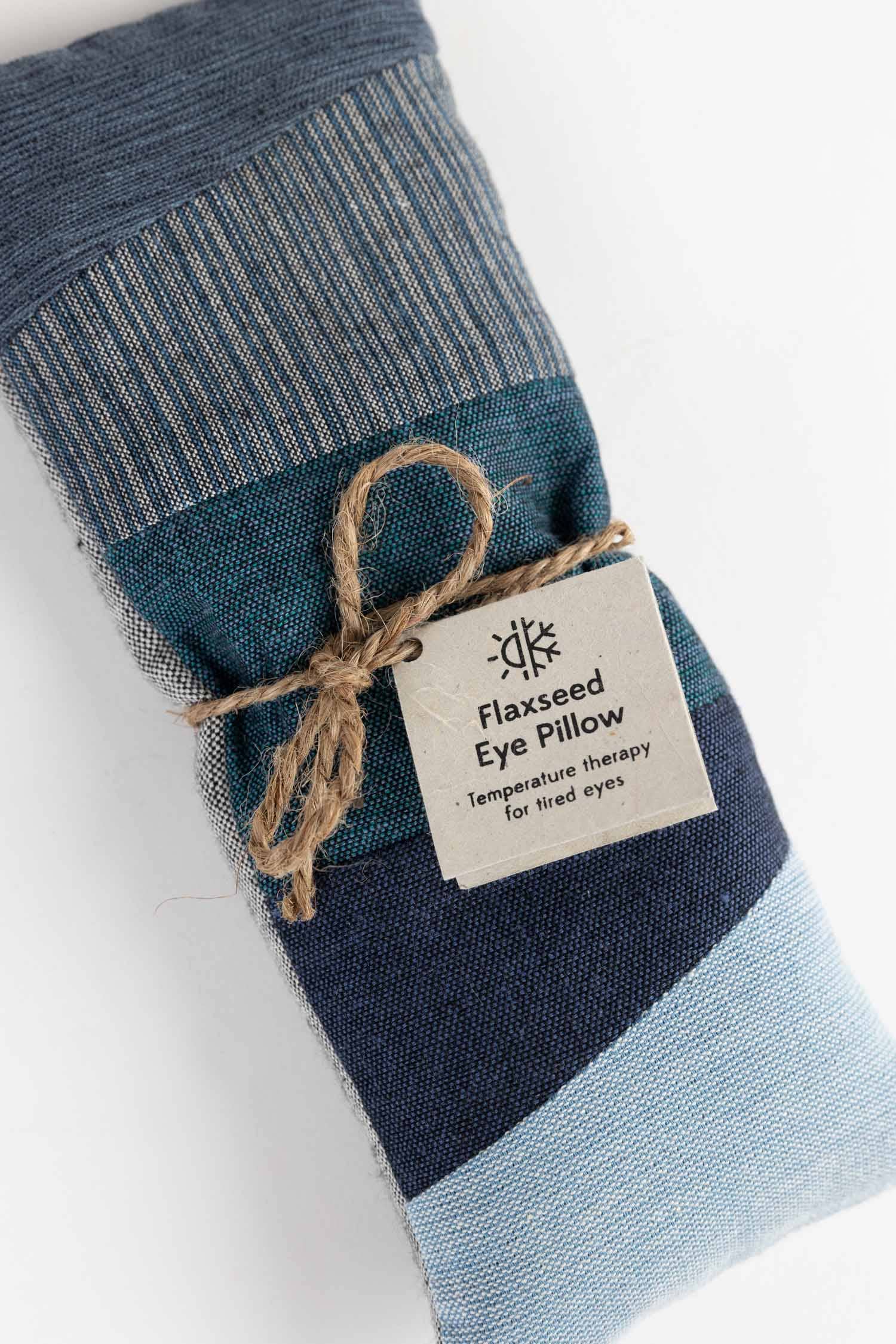 Flaxseed eye pillow with a label on a white background
