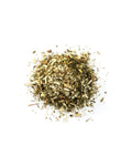 Pile of dried herbs on a white background