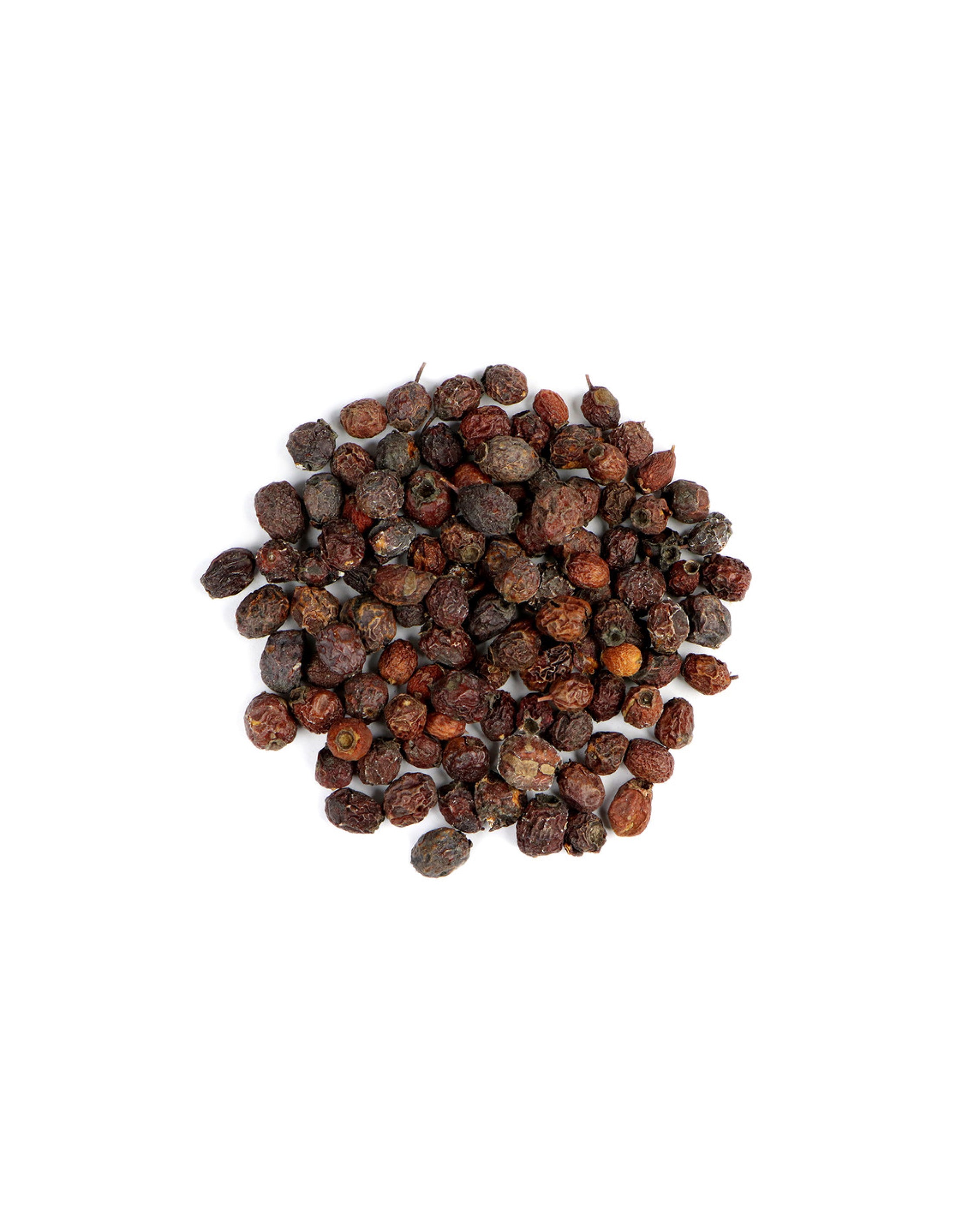 Pile of dried hawthorn berries on a white background