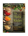 Book cover of 'The Herbal Kitchen' with spices and herbs on a rustic background