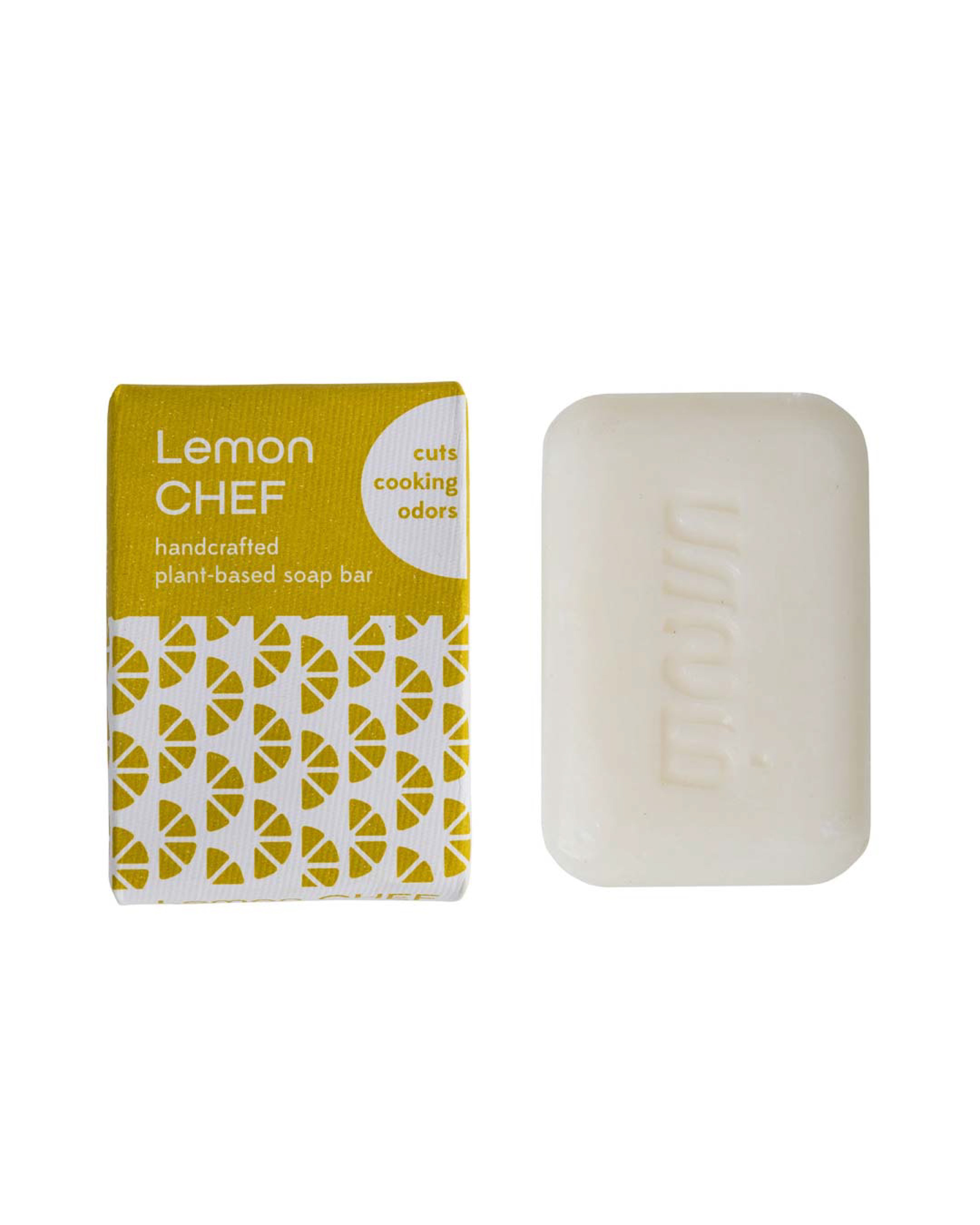 Handcrafted lemon chef soap bar with packaging on a white background