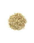 Pile of dried herbs on a white background