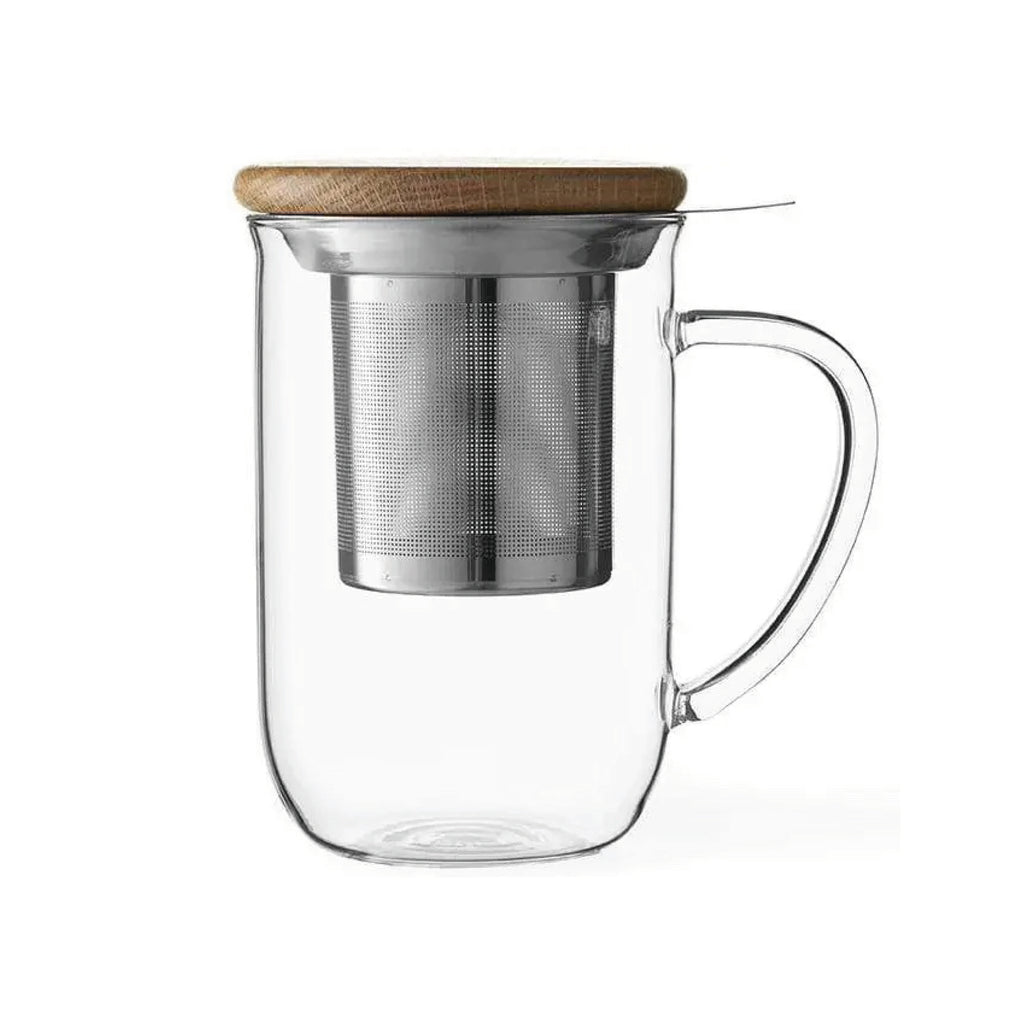 Clear glass mug with wooden lid and metal filter on a white background