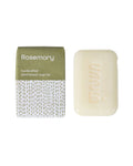 Handcrafted rosemary soap bar with packaging on a white background