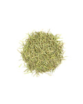 Pile of dried herbs on a white background