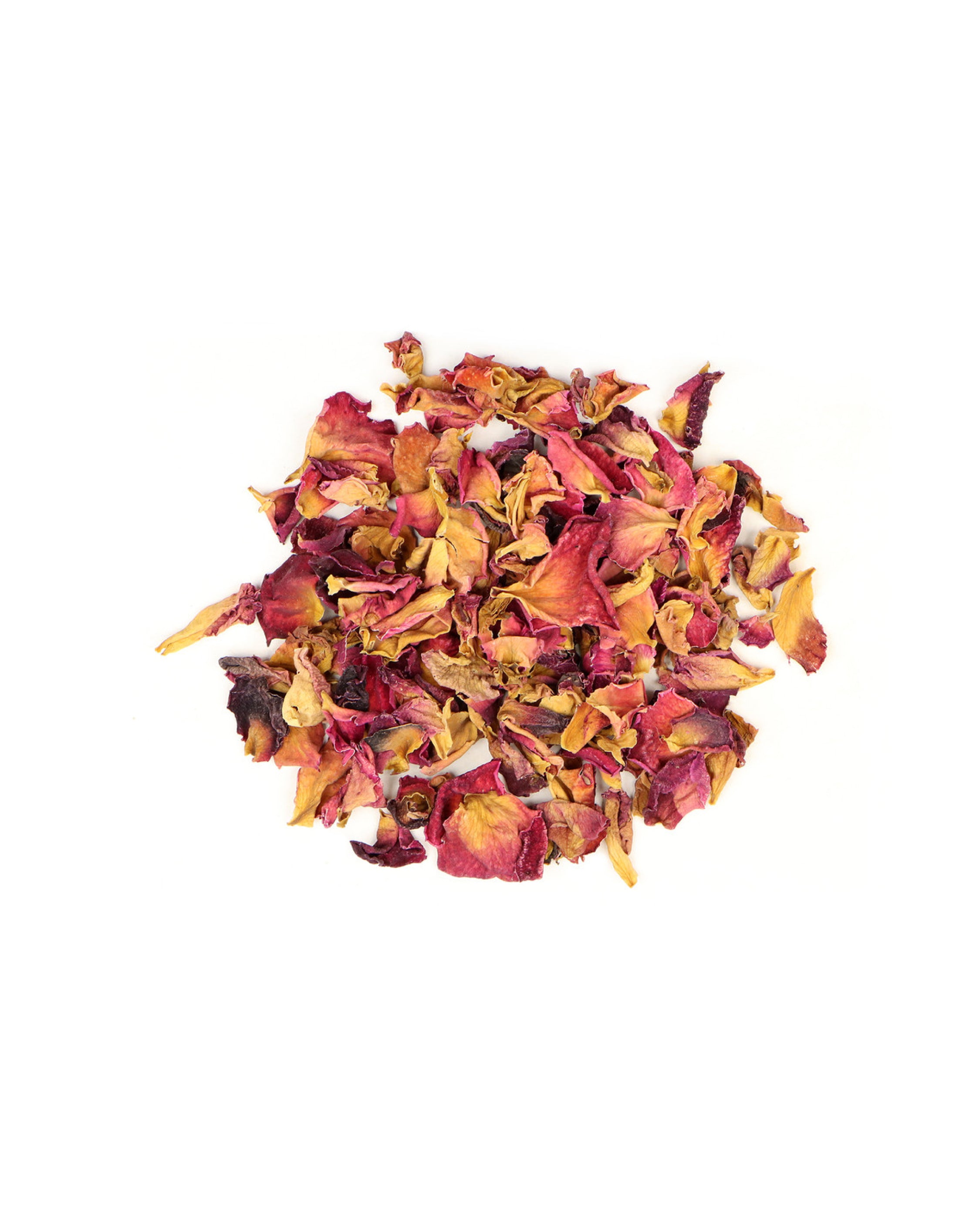 pink dried rose petals on a white background